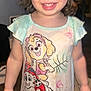 Amirah joined the competition — help win amazing prizes! child, toddler, smile, face, hair, clothing, nightgown, cartoon, puppy, character, indoor, person, cute, happy, portrait, young_child, hand, standing, girl, casual