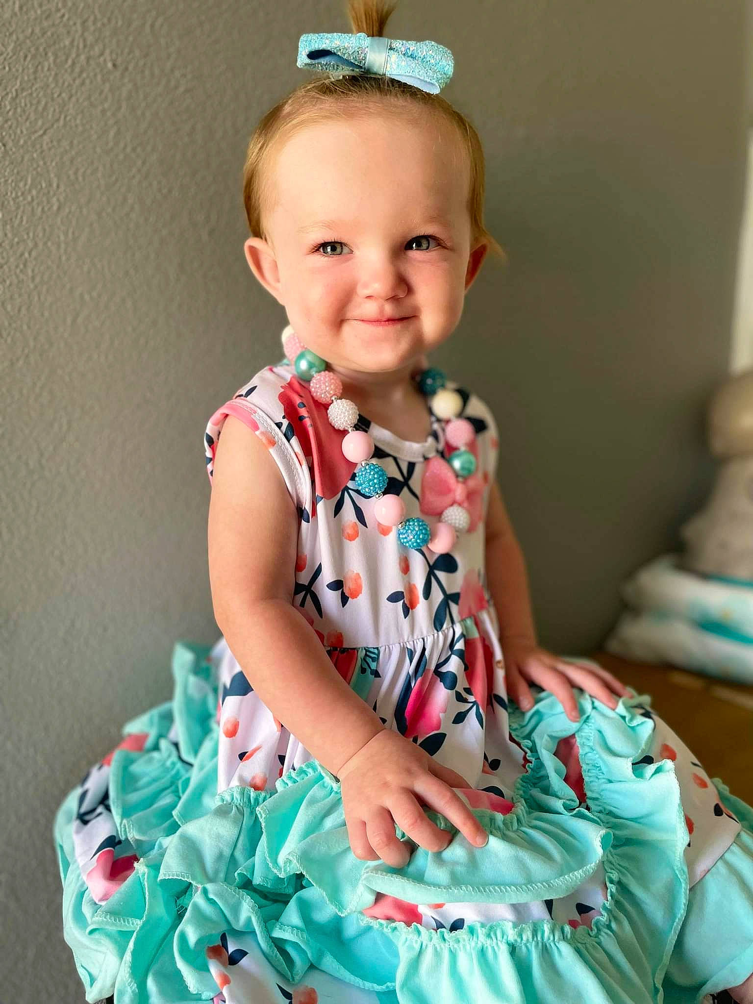 Angela is registered to the contest to win money with this photo: baby_toddler_clothing, day_dress, dress, eye, face, flash_photography, goggles, green, hair, hairstyle, happy, head, iris, joy, neck, person, pink, skin, sleeve, smile