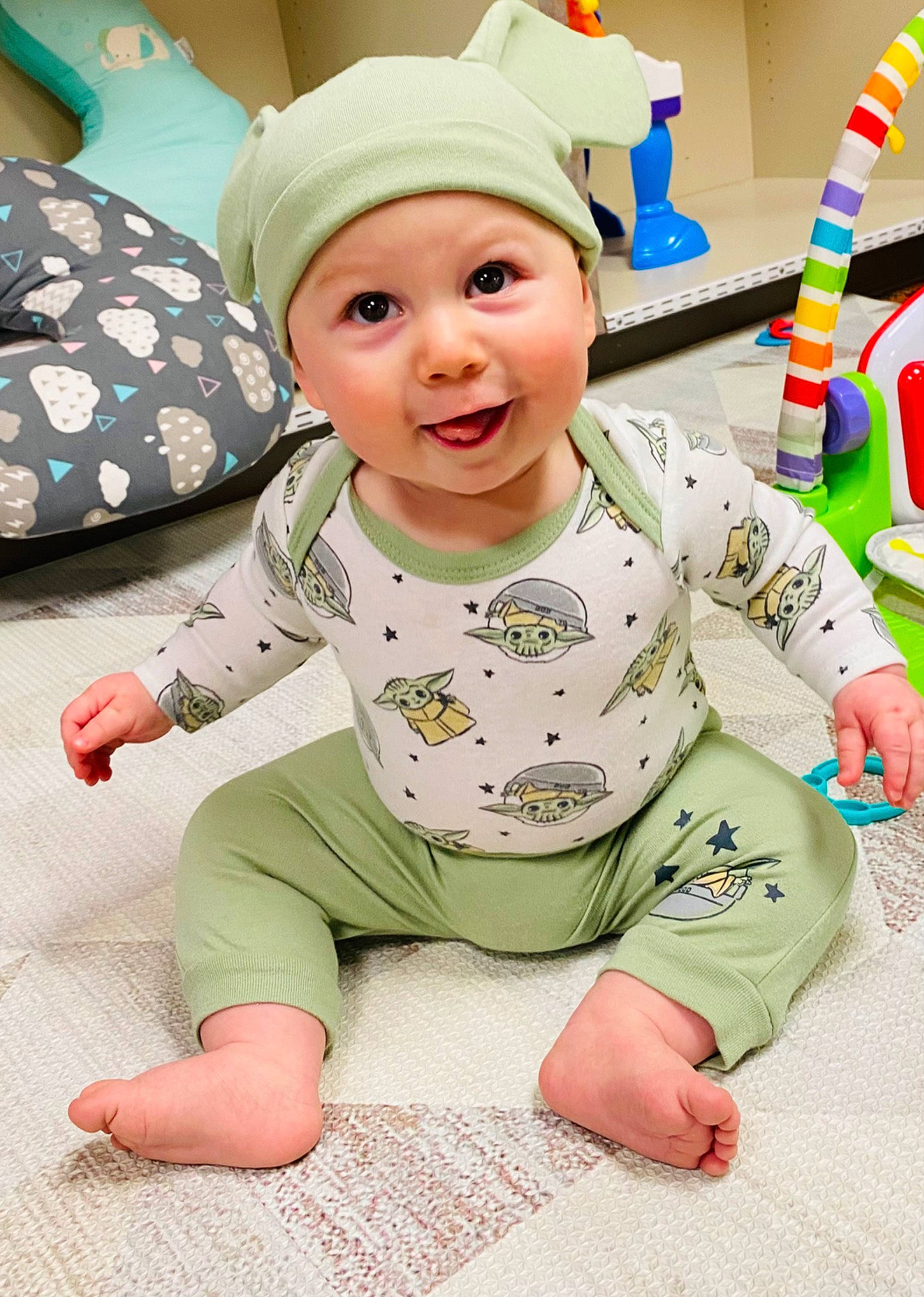 Israel joined the competition — help win amazing prizes! baby, baby_toddler_clothing, cheek, child, comfort, flooring, foot, fun, green, happy, headwear, party_supply, person, pink, play, sitting, skin, sleeve, smile, thumb