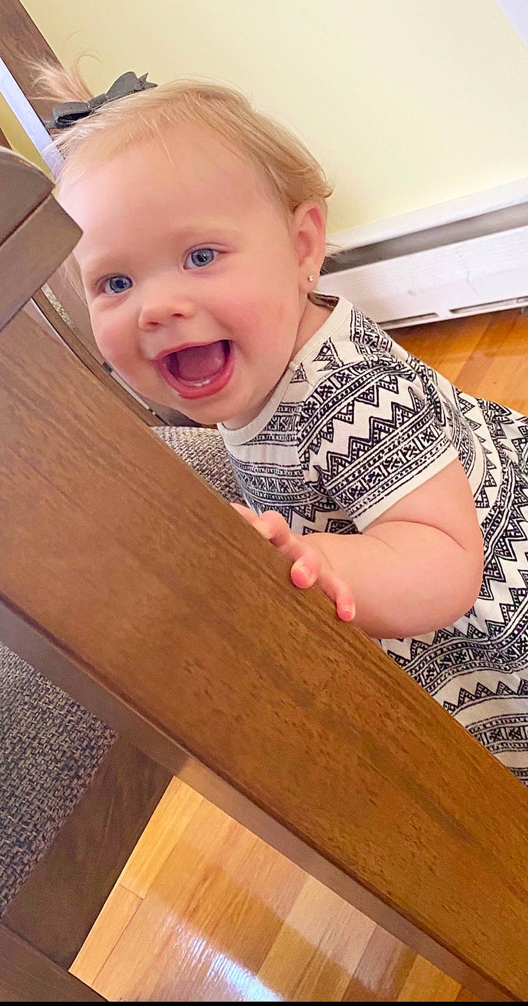 Everly Grace joined the competition — help win amazing prizes! baby, cheek, child, floor, flooring, hardwood, person, skin, smile, toddler, wood