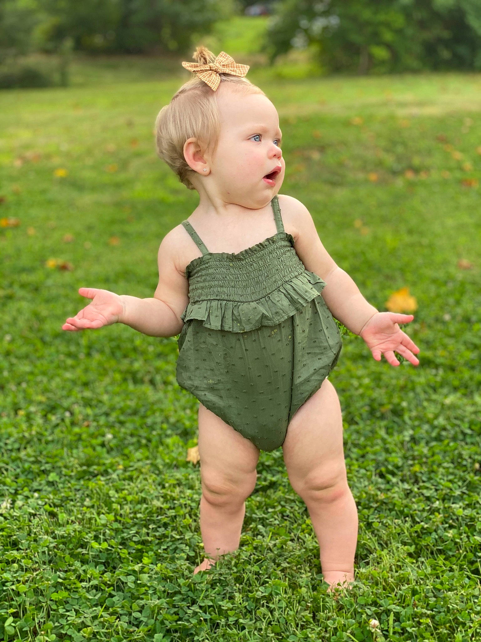 Everly Grace joined the competition — help win amazing prizes! baby, barefoot, child, dress, finger, grass, grass_family, grassland, green, lawn, meadow, people_in_nature, person, plant, play, summer, toddler