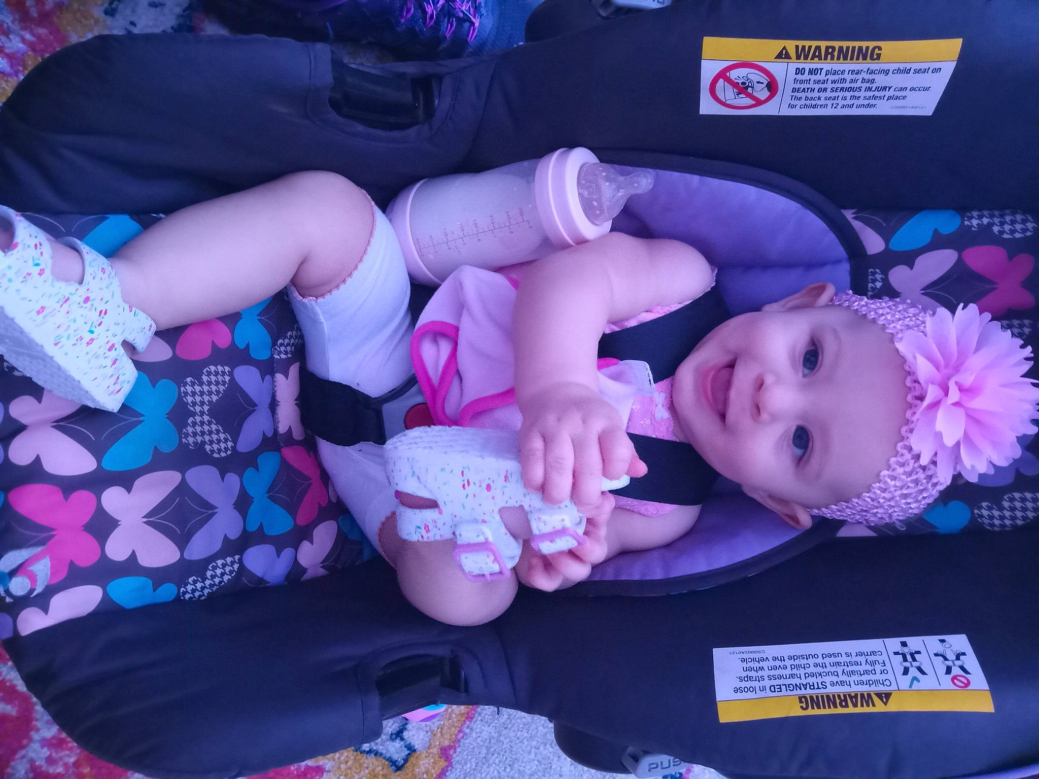 Luciana is registered to the contest to win money with this photo: baby, baby_products, baby_toddler_clothing, carmine, child, comfort, electric_blue, fun, joy, lap, linens, magenta, nail, pattern, person, pink, purple, room, smile, toddler