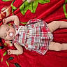 Kiriana joined the competition — help win amazing prizes! baby, sleeping, pacifier, plaid_dress, red_blanket, floral_pattern, infant, peaceful, cute, child, lying_down, soft_texture, indoors, relaxed, skin, small_hands, small_feet, head, nap, comfort