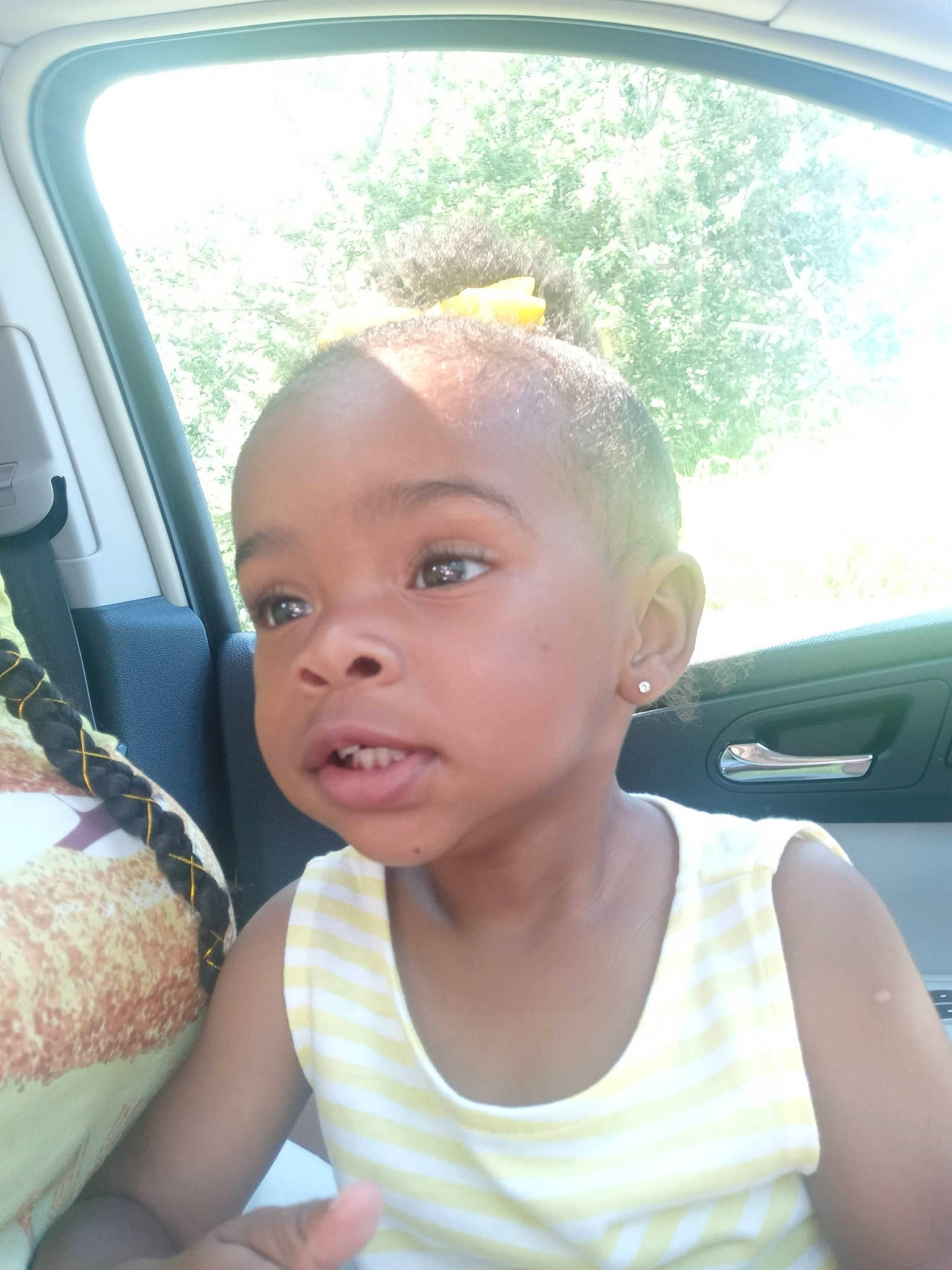 Reign Aylani joined the competition — help win amazing prizes! auto_part, automotive_exterior, automotive_lighting, automotive_mirror, baby_toddler_clothing, car, car_seat, cool, fun, happy, leisure, lip, motor_vehicle, nose, person, rear_view_mirror, skin, toddler, vehicle_door, white