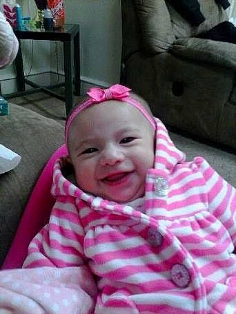 Alanah joined the competition — help win amazing prizes! baby, cheek, child, ear, electronic_device, face, facial_expression, head, joy, lip, mouth, person, pink, skin, smile, toddler