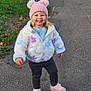 toddler, child, smiling, outdoor, path, pavement, grass, jacket, hat, pink, shoes, happy, winter_clothing, walking, cute, person, nature, daylight, young_child, casual