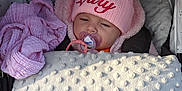 Lilly is registered to the contest to win money with this photo: baby, baby_products, baby_toddler_clothing, beanie, bonnet, child, headgear, pink, product, sleep, toddler