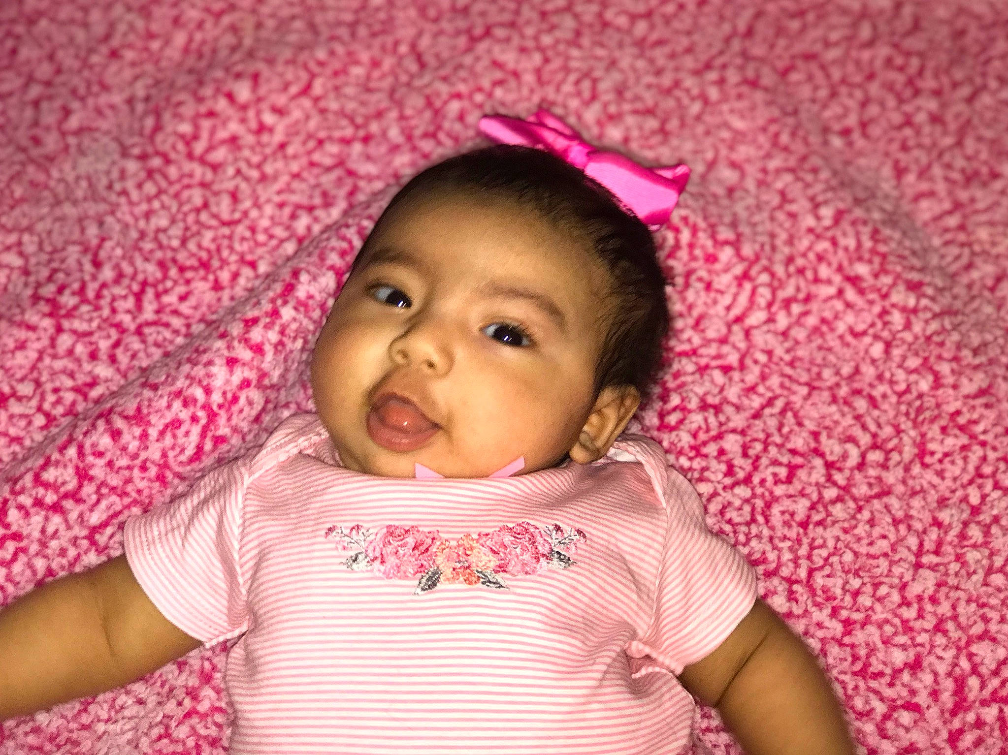 Selena joined the competition — help win amazing prizes! baby, beauty, cheek, child, chin, eye, face, facial_expression, fun, happy, head, iris, lip, mouth, nose, person, pink, skin, smile, textile