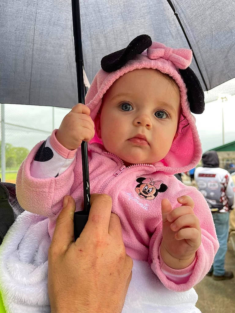 Zayda is registered to the contest to win money with this photo: baby, baby_toddler_clothing, cap, cheek, child, chin, eyelash, fashion_accessory, finger, fun, gesture, happy, headwear, lip, mouth, nose, person, pink, skin, sun_hat