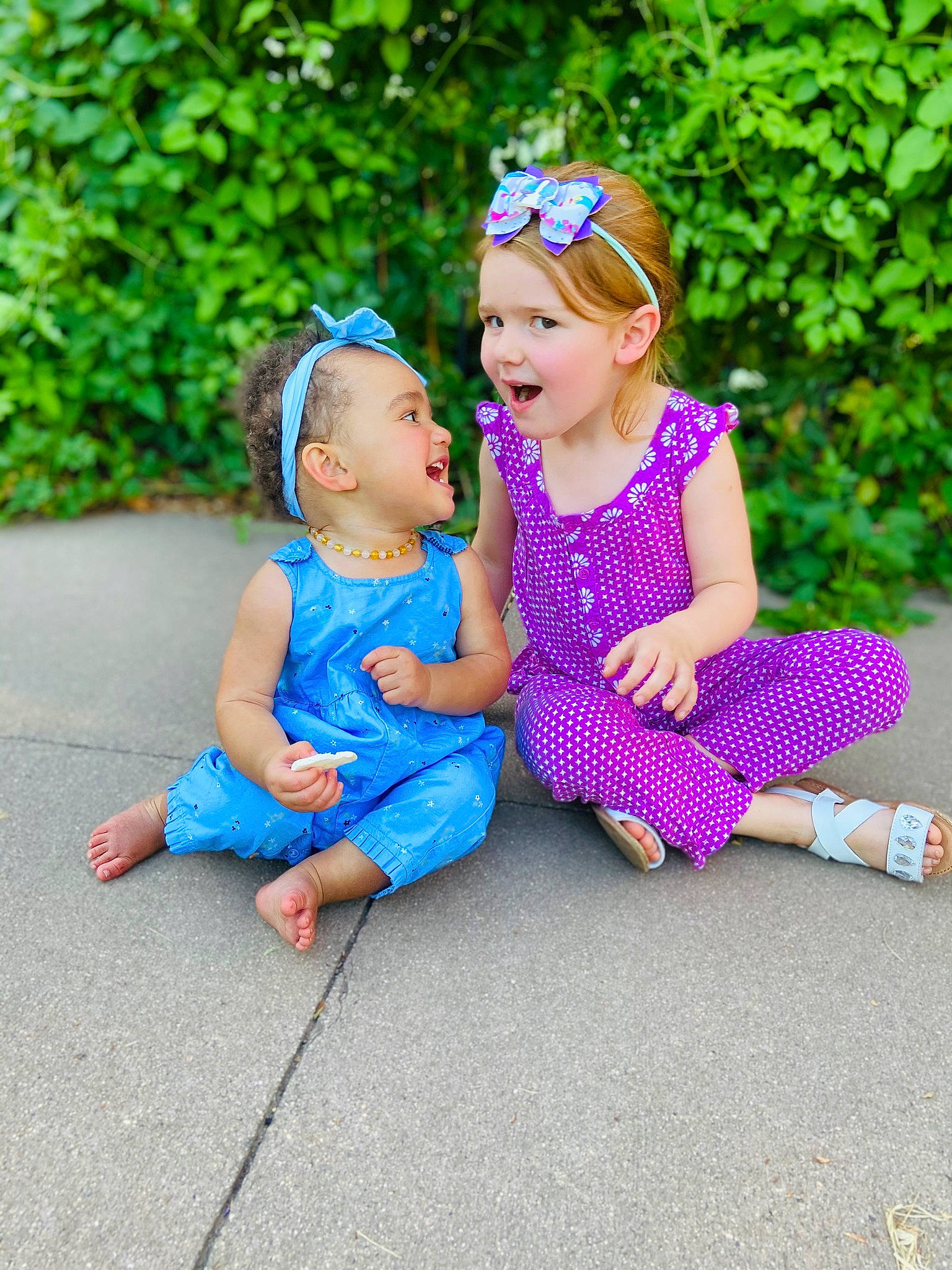 Aria is registered to the contest to win money with this photo: baby, child, dress, fun, hair_accessory, headgear, lavender, people, person, photograph, photography, pink, play, product, purple, sitting, summer, toddler, turquoise, vacation