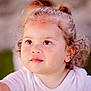 child, toddler, curly_hair, face, portrait, expressive_eyes, close_up, natural_light, outdoor, soft_background, innocence, young_child, cute, curly_hair_toddler, white_shirt, skin, person, baby, looking_up, daylight