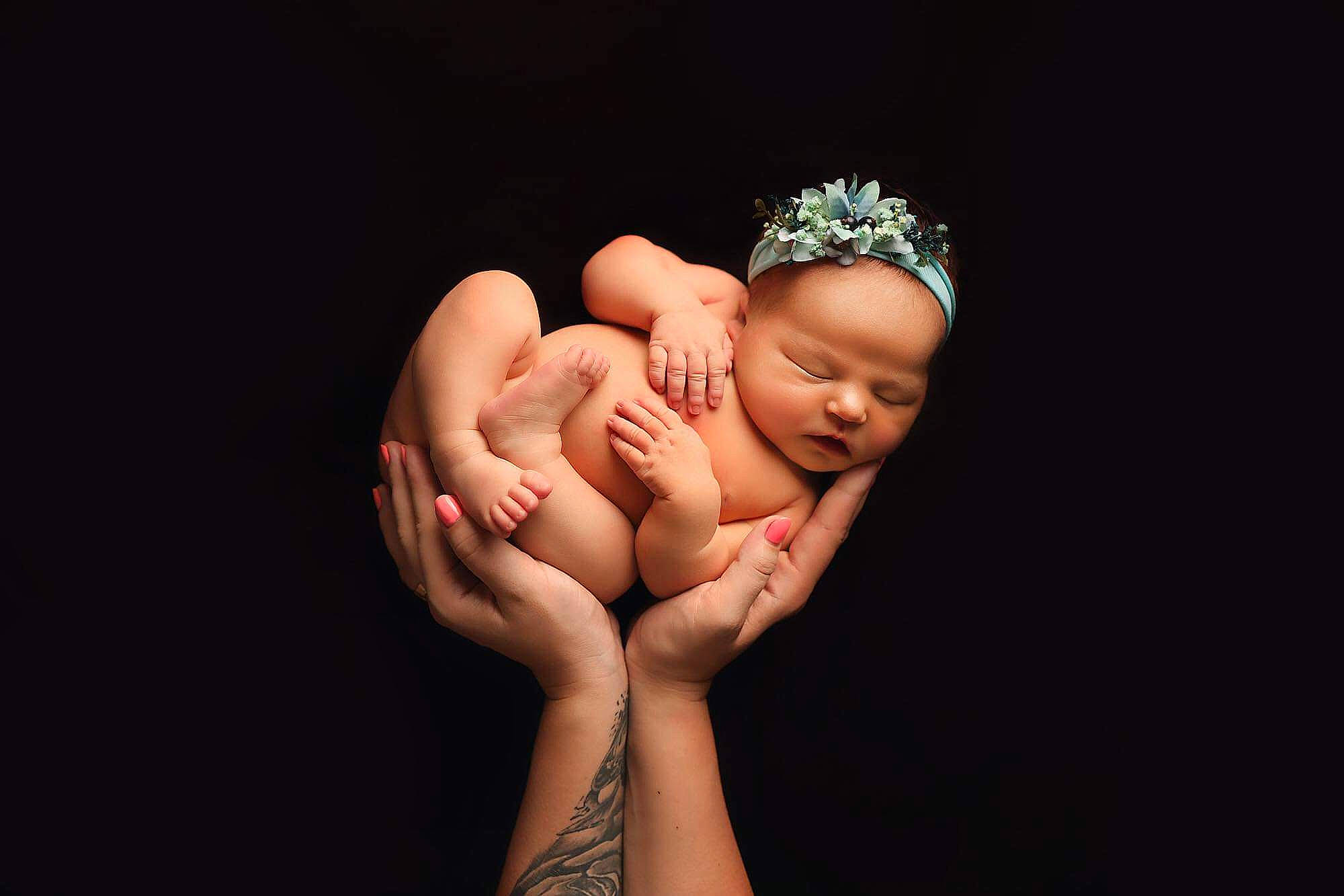 Amanda is registered to the contest to win money with this photo: arm, art, baby, child, finger, gesture, hair_accessory, hand, headpiece, headwear, human_body, love, muscle, person, photography