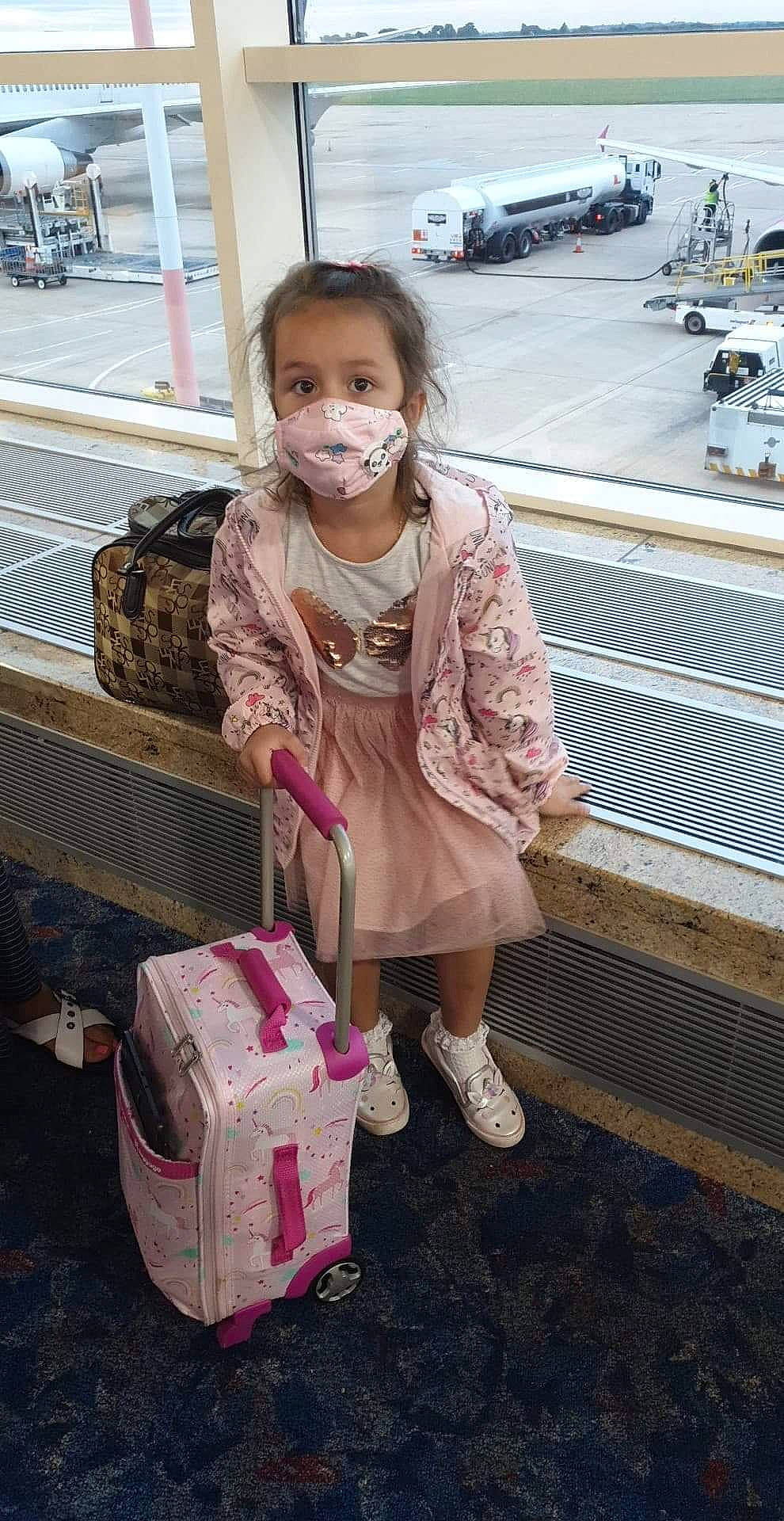 Andrea joined the competition — help win amazing prizes! baggage, child, person, pink