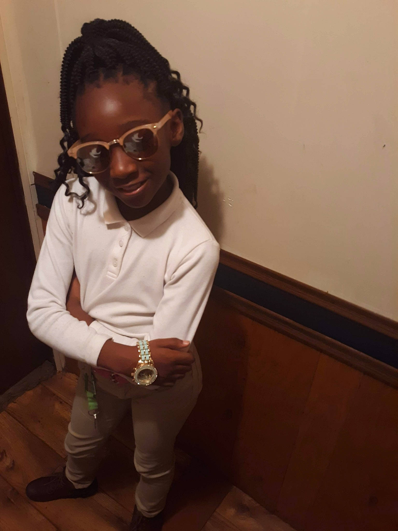 Shannon is registered to the contest to win money with this photo: beard, black_hair, child, cool, dreadlocks, eyewear, facial_hair, forehead, glasses, hair, hairstyle, human, long_hair, neck, outerwear, person, photography, room, sitting, vision_care