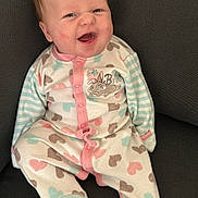 Eleanor joined the competition — help win amazing prizes! baby, babylaughing, clothing, couch, crying, cushion, face, formalwear, furniture, happy, head, homedecor, laughing, pajamas, pants, person, photography, portrait, sitting, suit