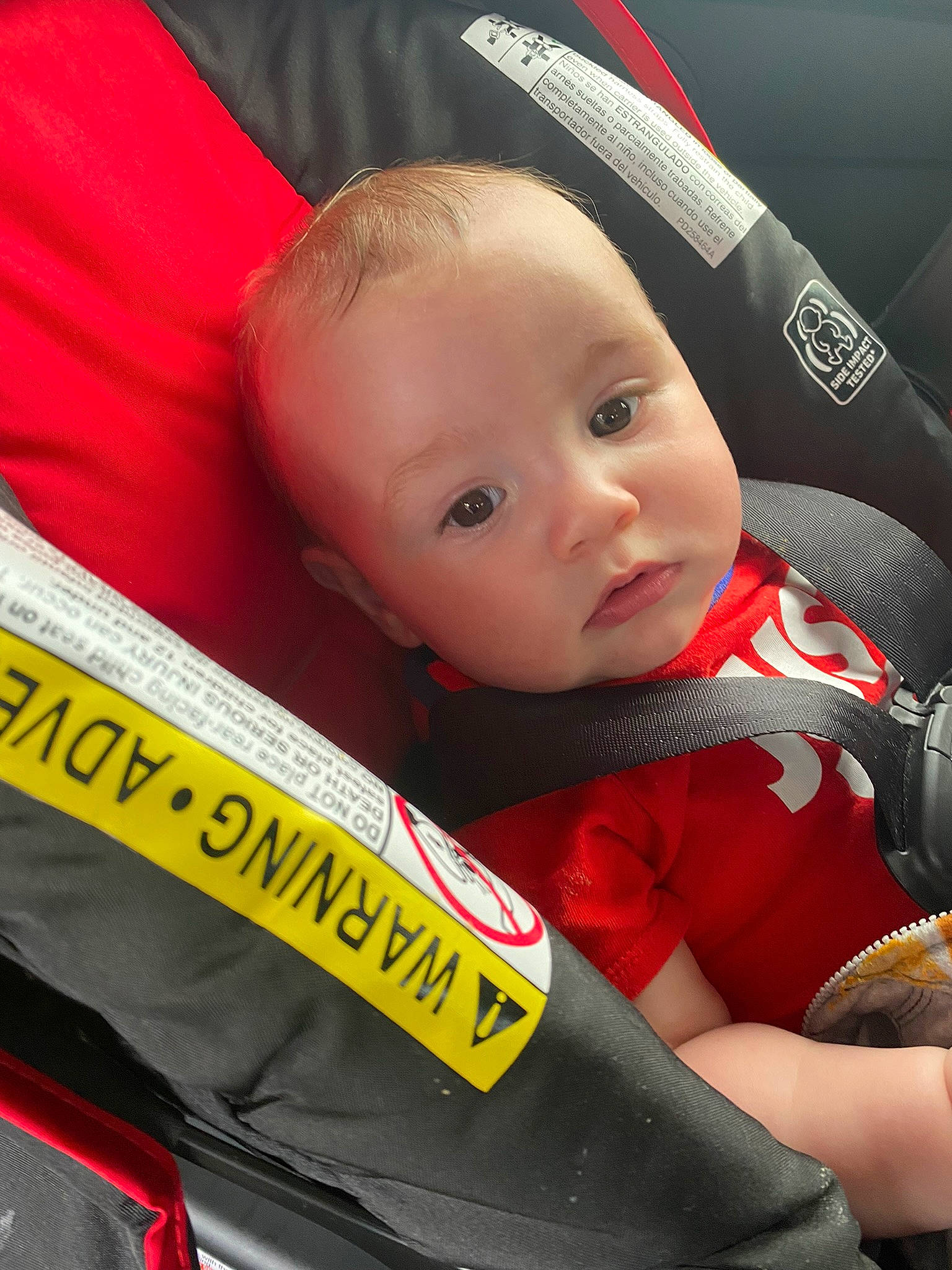 Arian is registered to the contest to win money with this photo: auto_part, baby, baby_carriage, baby_products, baby_safety, baby_toddler_clothing, car_seat, carmine, cheek, child, chin, comfort, face, fun, happy, iris, person, product, red, skin