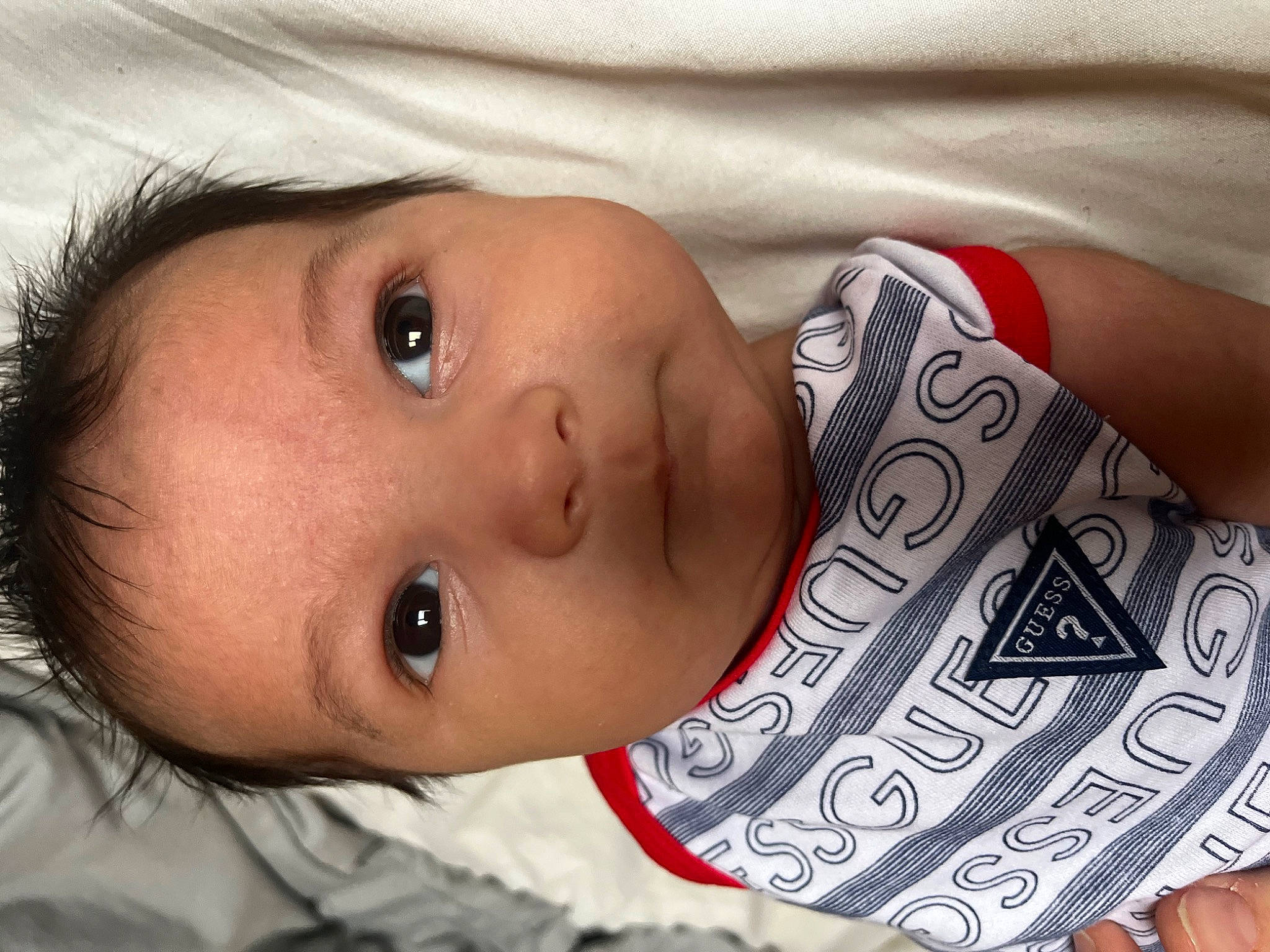 Iosua Jonathan is registered to the contest to win money with this photo: baby, banknote, beauty, cheek, child, chin, close_up, comfort, eyebrow, eyelash, facial_expression, forehead, happy, lip, mouth, nail, nose, pattern, person, skin