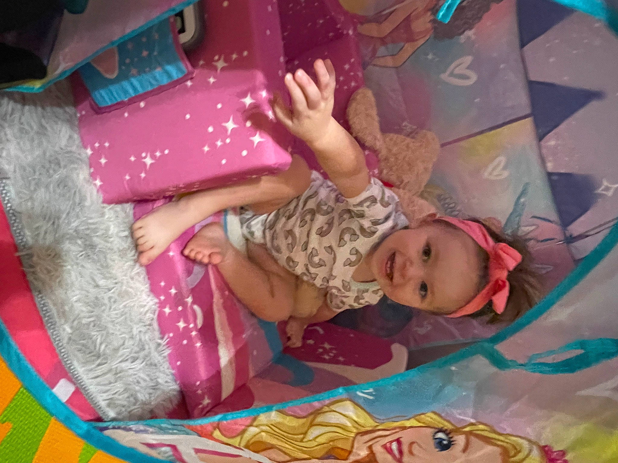 Braelynn is registered to the contest to win money with this photo: baby, child, comfort, design, event, fun, happy, human_body, joy, leisure, linens, magenta, pattern, person, pink, purple, room, skin, smile, textile