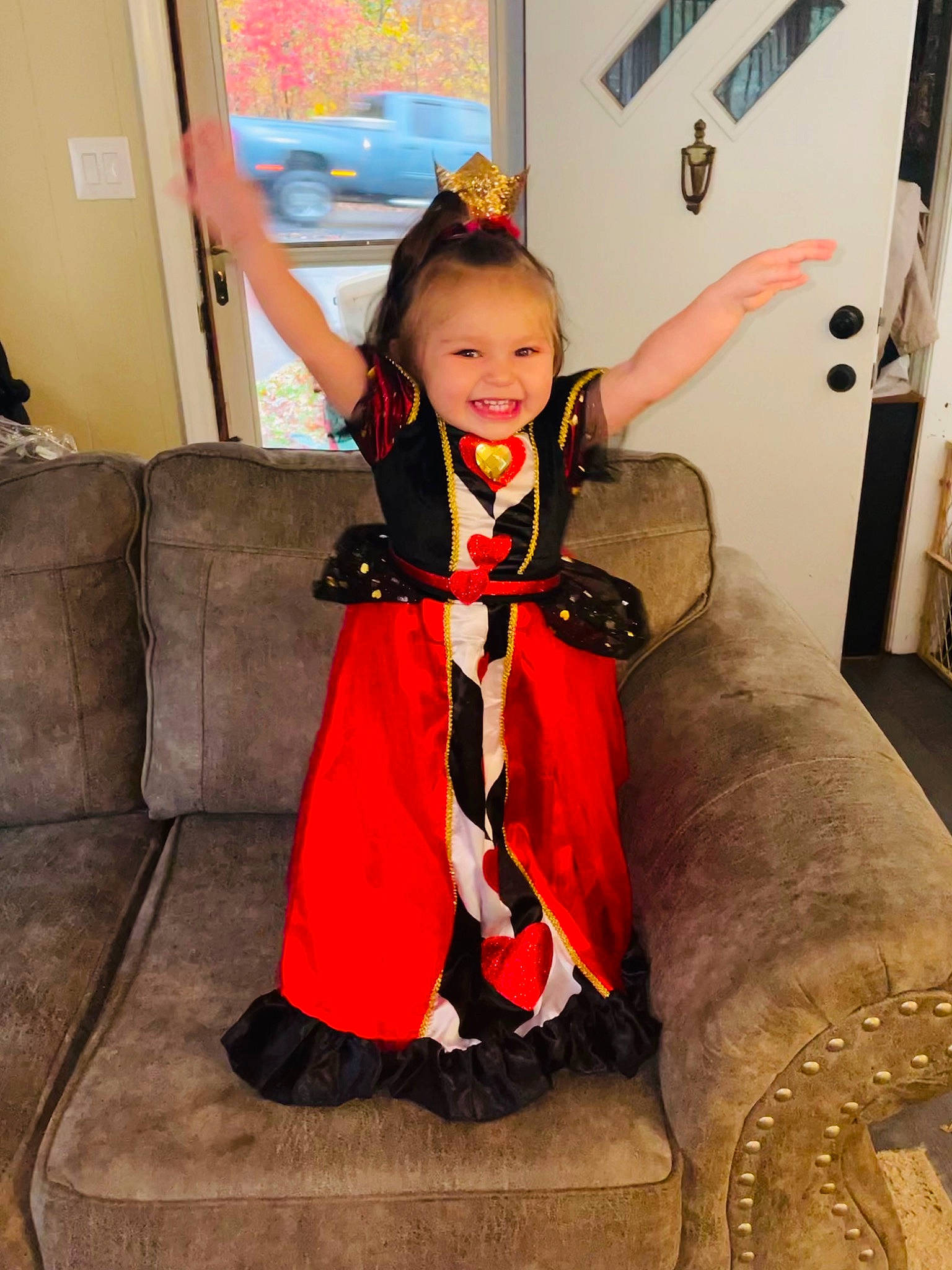 Braelynn joined the competition — help win amazing prizes! costume, costume_design, dress, event, fashion, fashion_accessory, fashion_design, fictional_character, flooring, formal_wear, fun, fur, happy, joy, long_hair, person, room, sitting, smile, suit