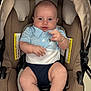 Damon Jiménez Romeu is registered to the contest to win money with this photo: baby, infant, car_seat, blue_clothing, plush_toy, brown_fabric, cute, hands, feet, child, indoor, seatbelt, comfortable, adorable, young_child, playful, portrait, sitting, expression, soft