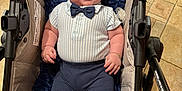 Damon Jiménez Romeu joined the competition — help win amazing prizes! baby, stroller, blanket, clothing, bow_tie, footwear, happy, infant, person, portrait, smile, indoor, fabric, cushion, legs, feet, hand, head, skin, toy