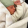 Pierre-Yves participe au concours pour gagner de l'argent avec cette photo : baby, newborn, sleeping, blanket, hat, knitwear, cozy, infant, child, soft, warm, cute, peaceful, wrapped, portrait, resting, fuzzy, white, green, hand