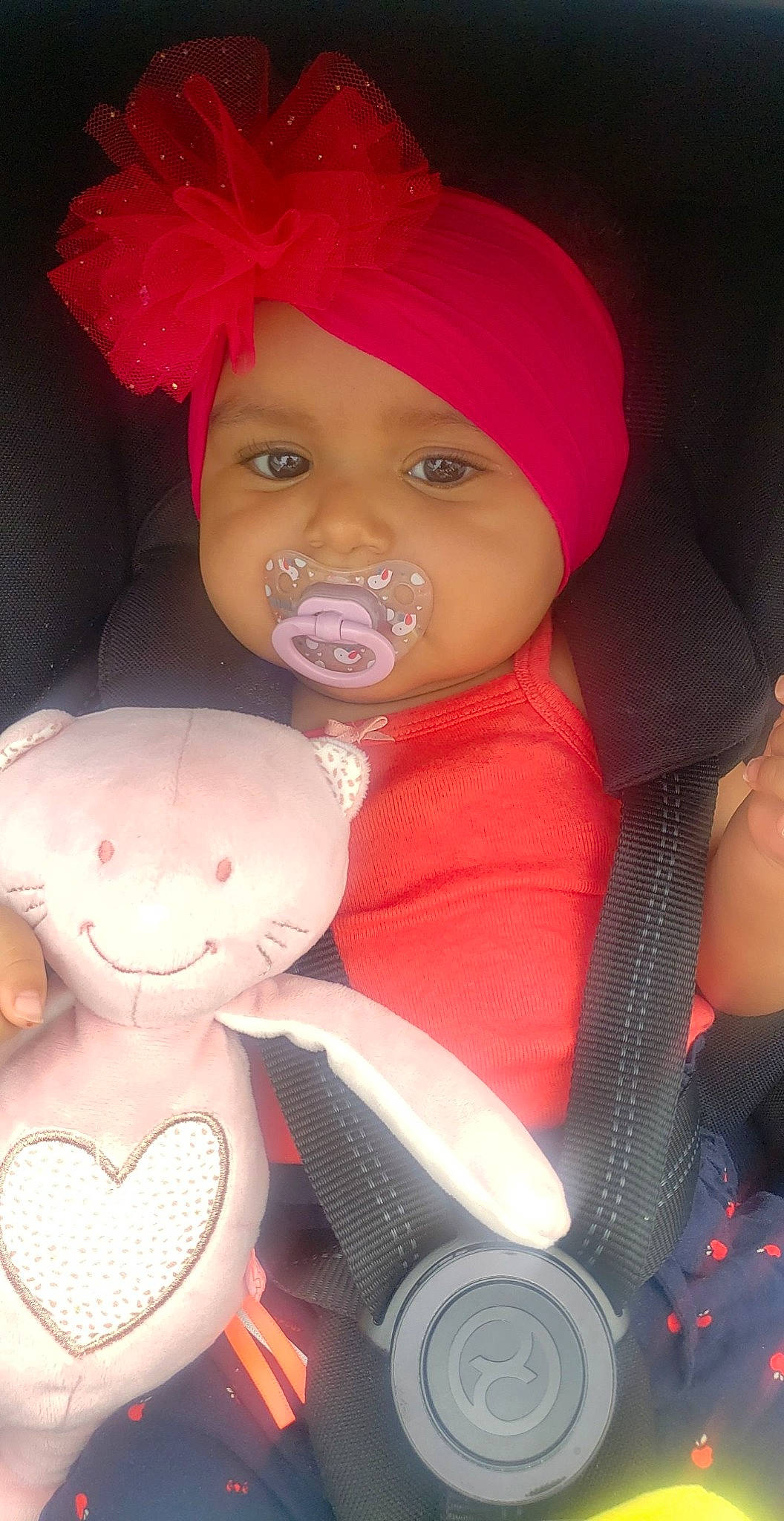 Aliyah participe au concours pour gagner de l'argent avec cette photo : baby, baby_carriage, baby_products, cheek, child, design, eyebrow, eyelash, fun, headwear, lip, material_property, mouth, nose, organ, people, person, pink, red, skin