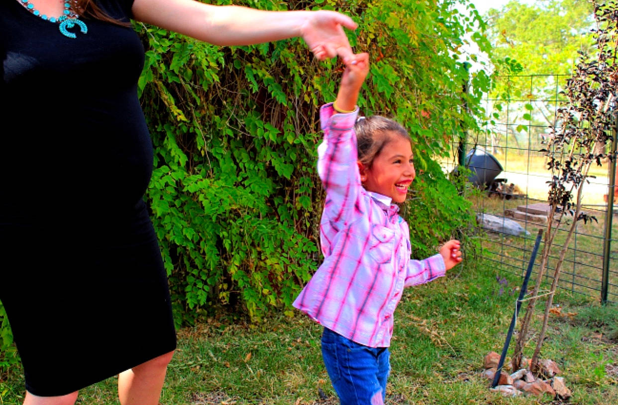 Audrie is registered to the contest to win money with this photo: backyard, child, fun, games, garden, gesture, grass, green, happy, joy, lawn, lawn_game, person, photography, plant, play, recreation, summer, toddler, tree