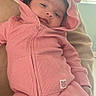 Valentina is registered to the contest to win money with this photo: adult, baby, bear_ears, casual, child, cozy, cute, hand, holding, hood, indoors, infant, light, onesie, person, pink_clothing, portrait, soft_light, warm, window