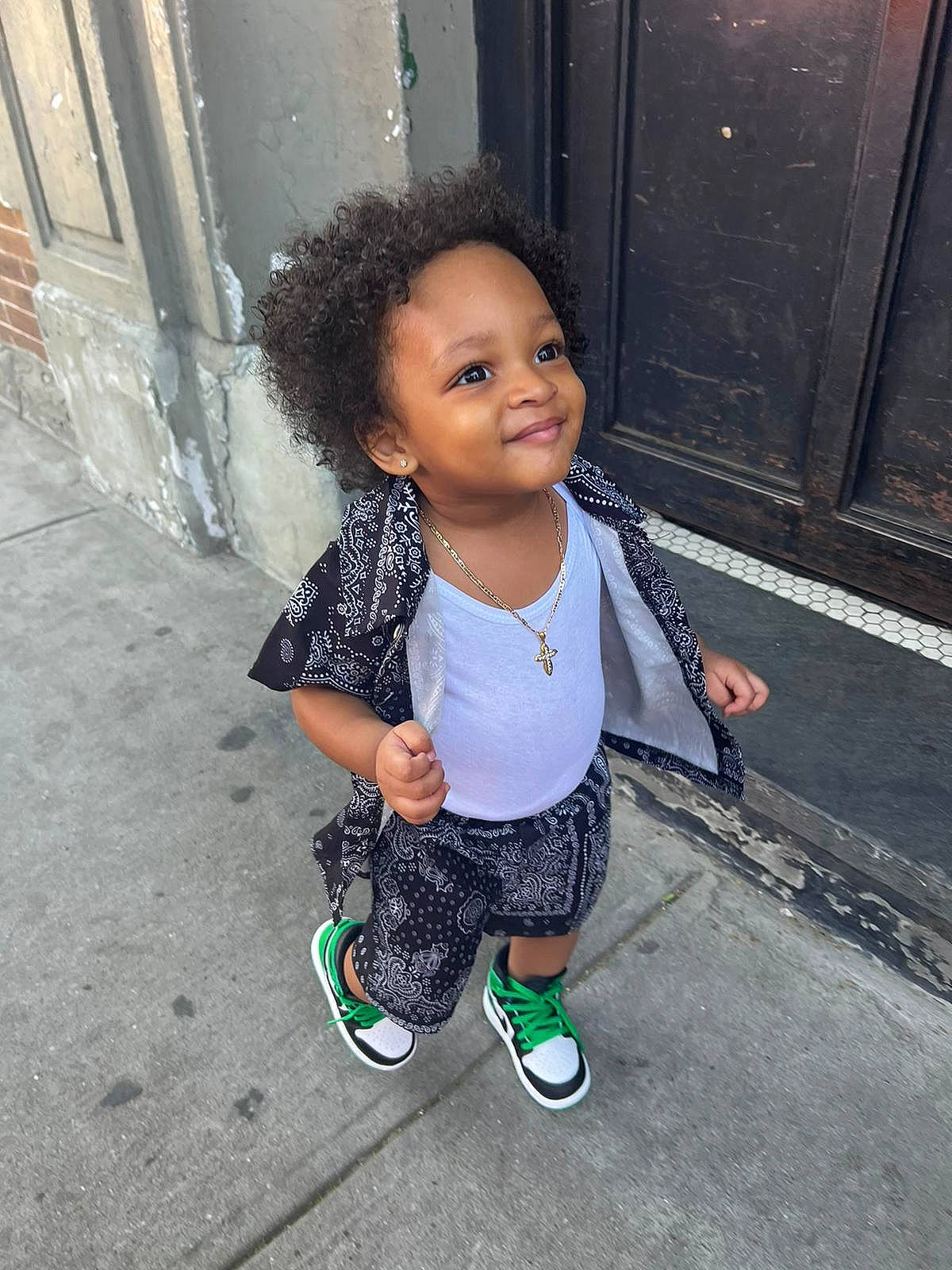 Josiah joined the competition — help win amazing prizes! baby_toddler_clothing, child, concrete, cool, door, electric_blue, fun, happy, head, human, joy, magenta, person, road_surface, sidewalk, sitting, sleeve, smile, street, t_shirt