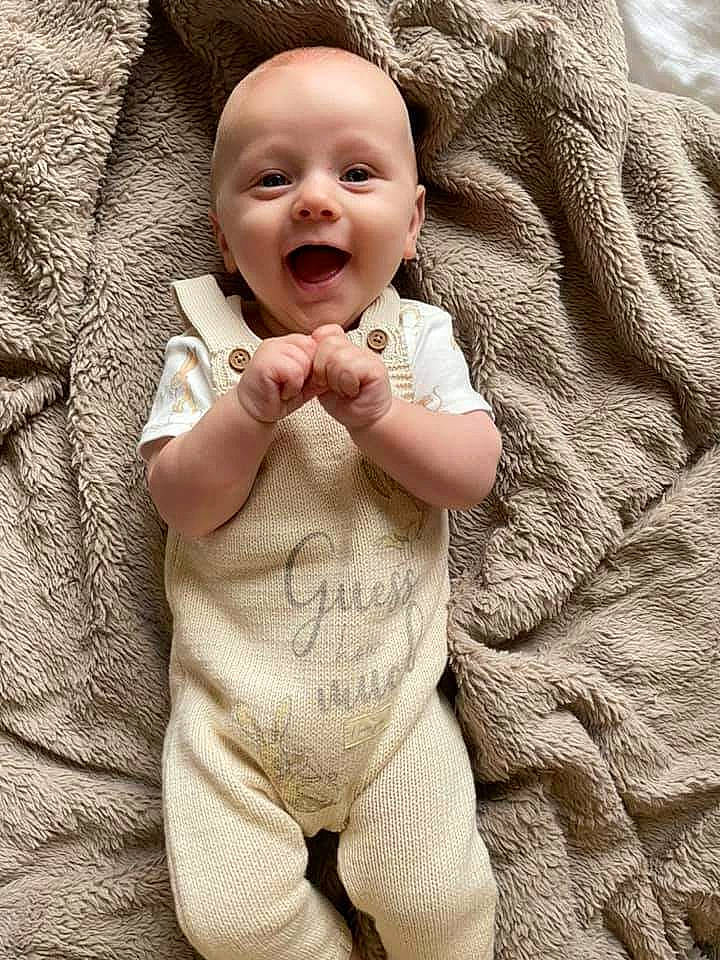 Brodie joined the competition — help win amazing prizes! baby, baby_toddler_clothing, cheek, comfort, eye, face, finger, gesture, hand, happy, head, human_body, lip, mouth, nose, outerwear, person, skin, sleeve, smile