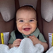 Roman joined the competition — help win amazing prizes! baby, smiling, infant, blanket, car_seat, child, happy, cute, portrait, face, safety_strap, clothing, indoor, cozy, young_child, soft_texture, head, skin, person, seat