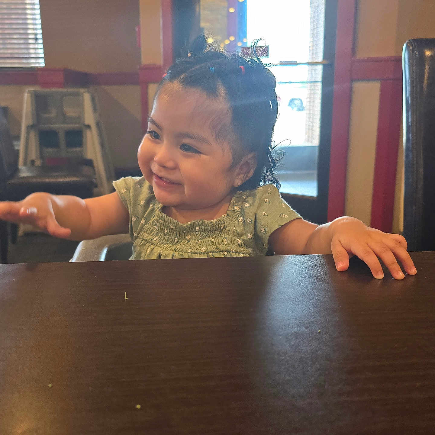 Rosa joined the competition — help win amazing prizes! braids, child, clothing, cute, cute_expression, face, furniture, hair, happy, indoor, light, person, restaurant, seat, skin, smiling, table, toddler, window, young