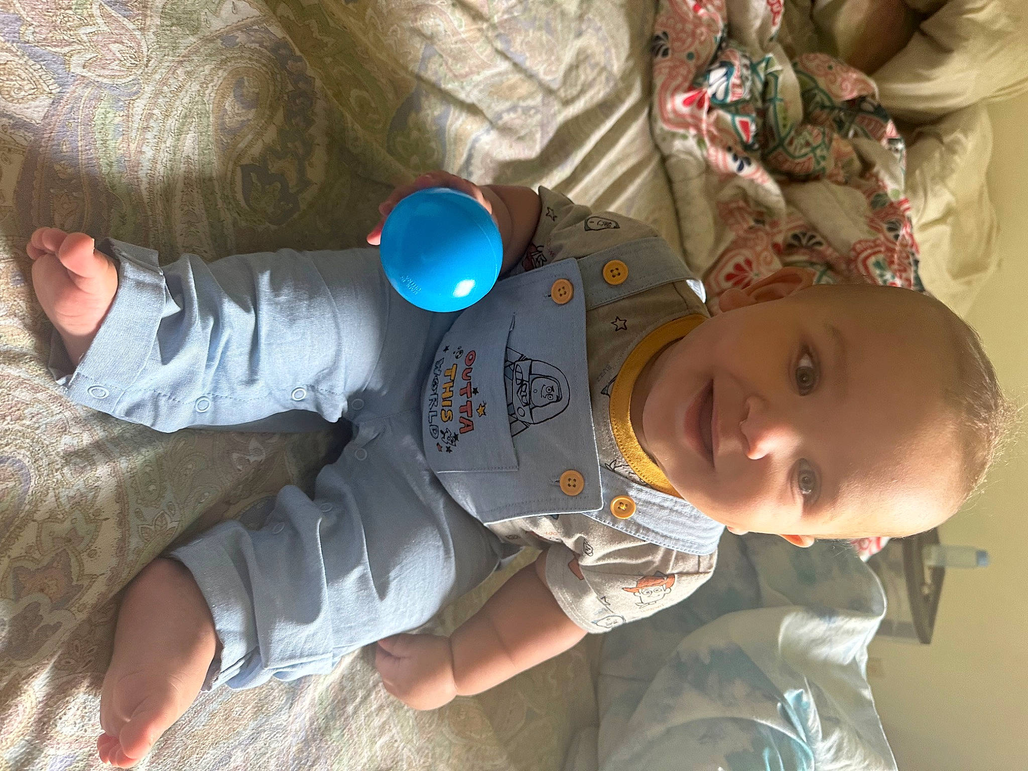 Jamal is registered to the contest to win money with this photo: baby, baby_products, baby_toddler_clothing, child, comfort, fun, happy, leisure, mouth, person, plastic, play, sitting, smile, space, toddler, vacation