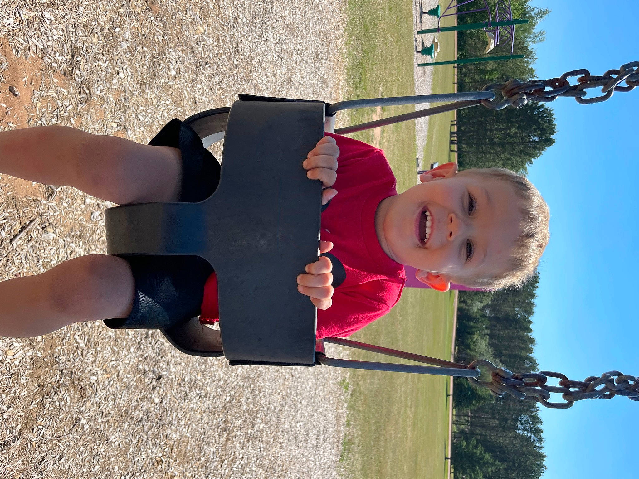 Thomas joined the competition — help win amazing prizes! baby_toddler_clothing, carmine, child, face, fun, grass, happy, hat, human_leg, knee, leisure, person, plant, play, pole, sky, smile, sock, thigh, toddler