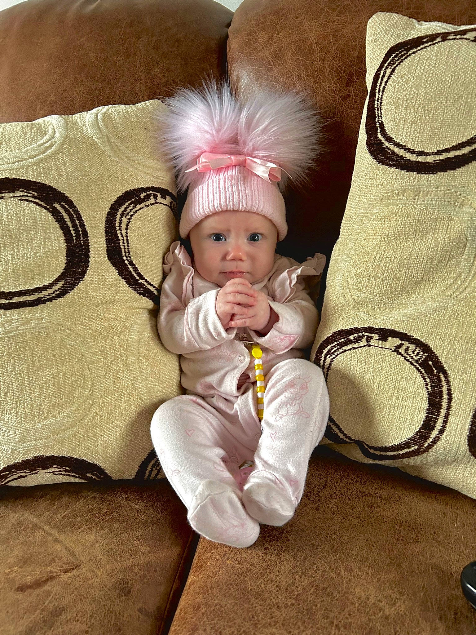 Darcie is registered to the contest to win money with this photo: baby, baby_sleeping, baby_toddler_clothing, child, comfort, costume_hat, fashion_accessory, finger, foot, hand, happy, hat, head, headgear, headwear, linens, person, sitting, sleeve, textile