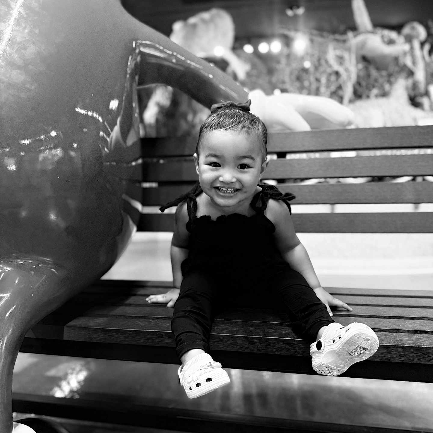 Halo-Rose joined the competition — help win amazing prizes! toddler, child, smile, bench, shoes, bow, black_and_white, indoor, sculpture, playful, happy, person, portrait, wooden_bench, lighting, cute, sitting, clothing, fashion, baby