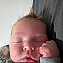 Kannan is registered to the contest to win money with this photo: baby, cheek, child, closeup, clothing, cute, face, fist, hair, hand, indoors, infant, mohawk, peaceful, portrait, resting, skin, sleeping, soft_lighting, young