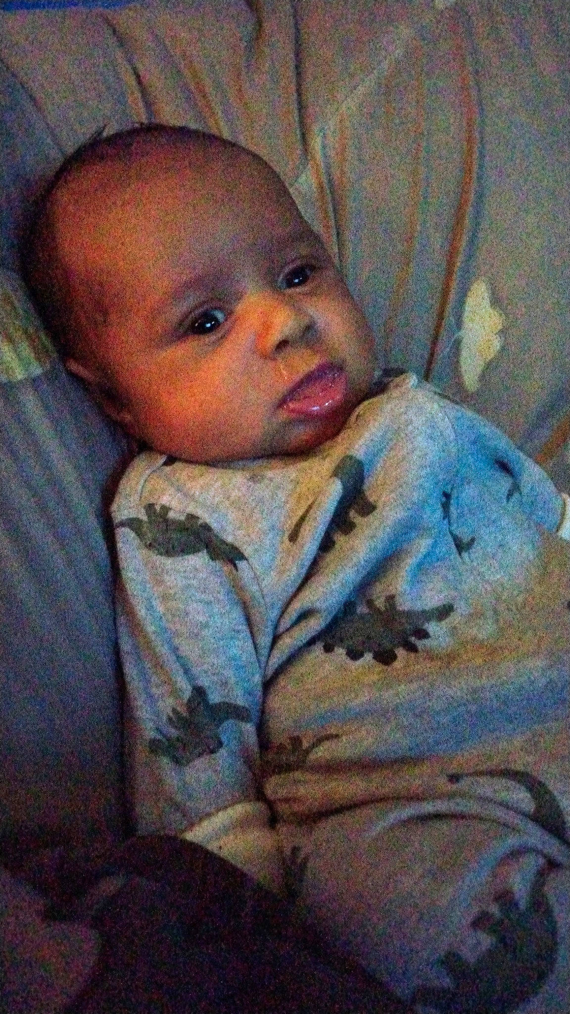 Aizen is registered to the contest to win money with this photo: baby, baby_products, baby_toddler_clothing, bedding, bedtime, cheek, child, comfort, eyebrow, iris, linens, nose, person, room, sitting, textile, toddler