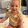 Liam joined the competition — help win amazing prizes! toddler, baby, smiling, child, indoor, playmat, cute, happy, portrait, sitting, striped_shirt, shorts, blue_eyes, hair_tuft, home, laundry_basket, toy, floor, colorful, infant