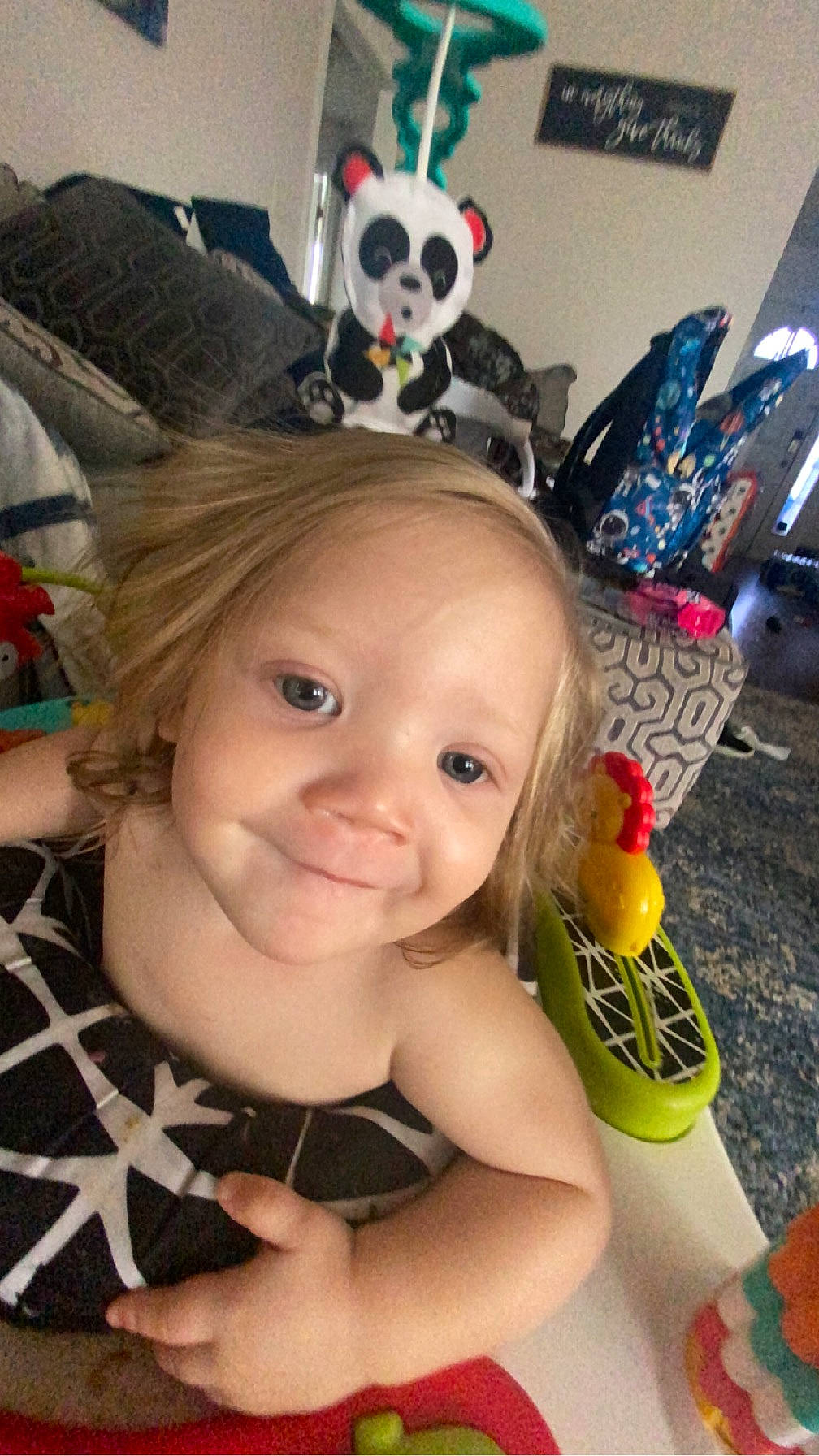 Legend is registered to the contest to win money with this photo: baby, cap, child, cool, costume_hat, fashion_accessory, fun, happy, headgear, joy, party_supply, person, pink, plastic_bottle, room, skin, smile, snapshot, thumb, toddler