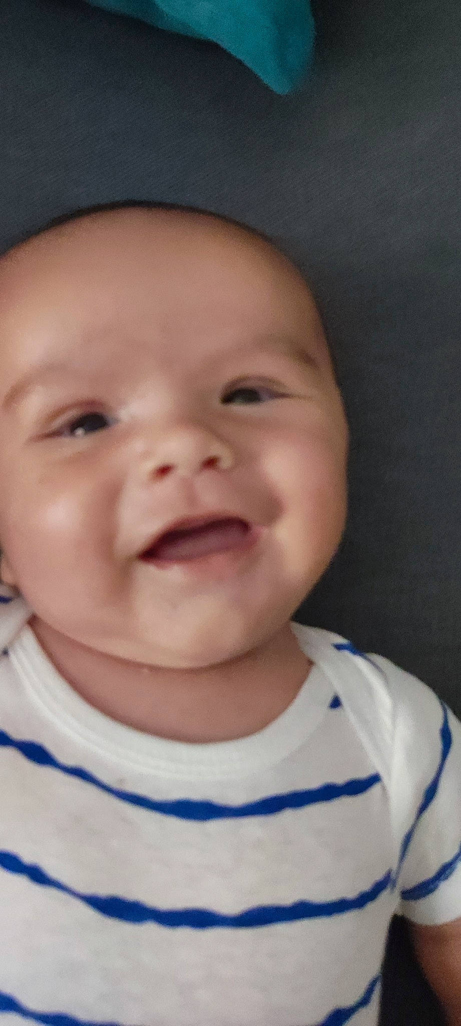 Evan participe au concours pour gagner de l'argent avec cette photo : baby, baby_toddler_clothing, cheek, child, chin, eye, eyebrow, eyelash, fun, happy, iris, jaw, lip, mouth, nose, person, skin, sleeve, smile, toddler