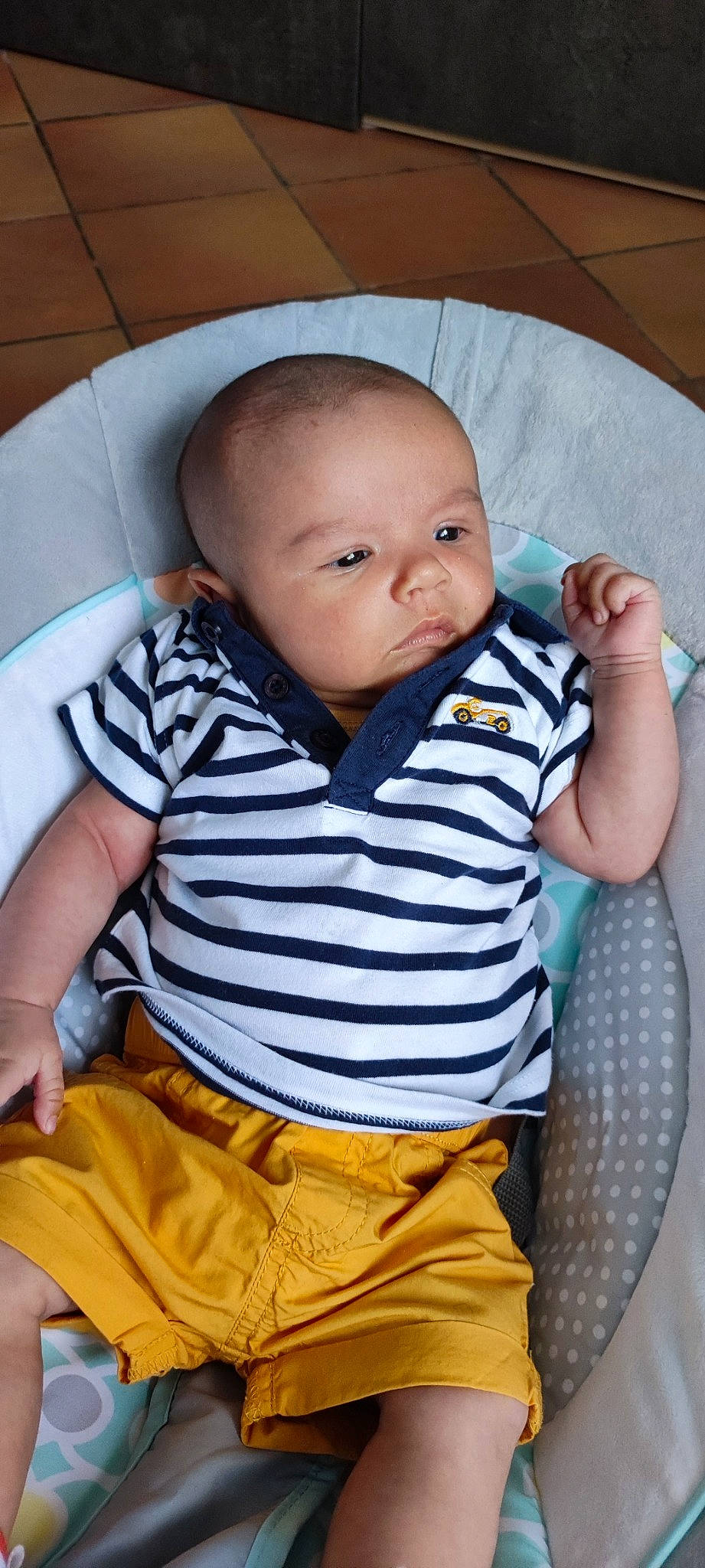 Evan participe au concours pour gagner de l'argent avec cette photo : baby_toddler_clothing, cheek, chin, collar, comfort, eye, facial_expression, hairstyle, head, human_body, iris, khaki_pants, neck, nose, person, product, skin, sleeve, standing, t_shirt