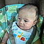 Hunter joined the competition — help win amazing prizes! baby, child, infant, car_seat, seatbelt, onesie, animal_print, giraffe, elephant, blue, green, yellow, red, face, skin, hair, expression, sitting, clothing, cute