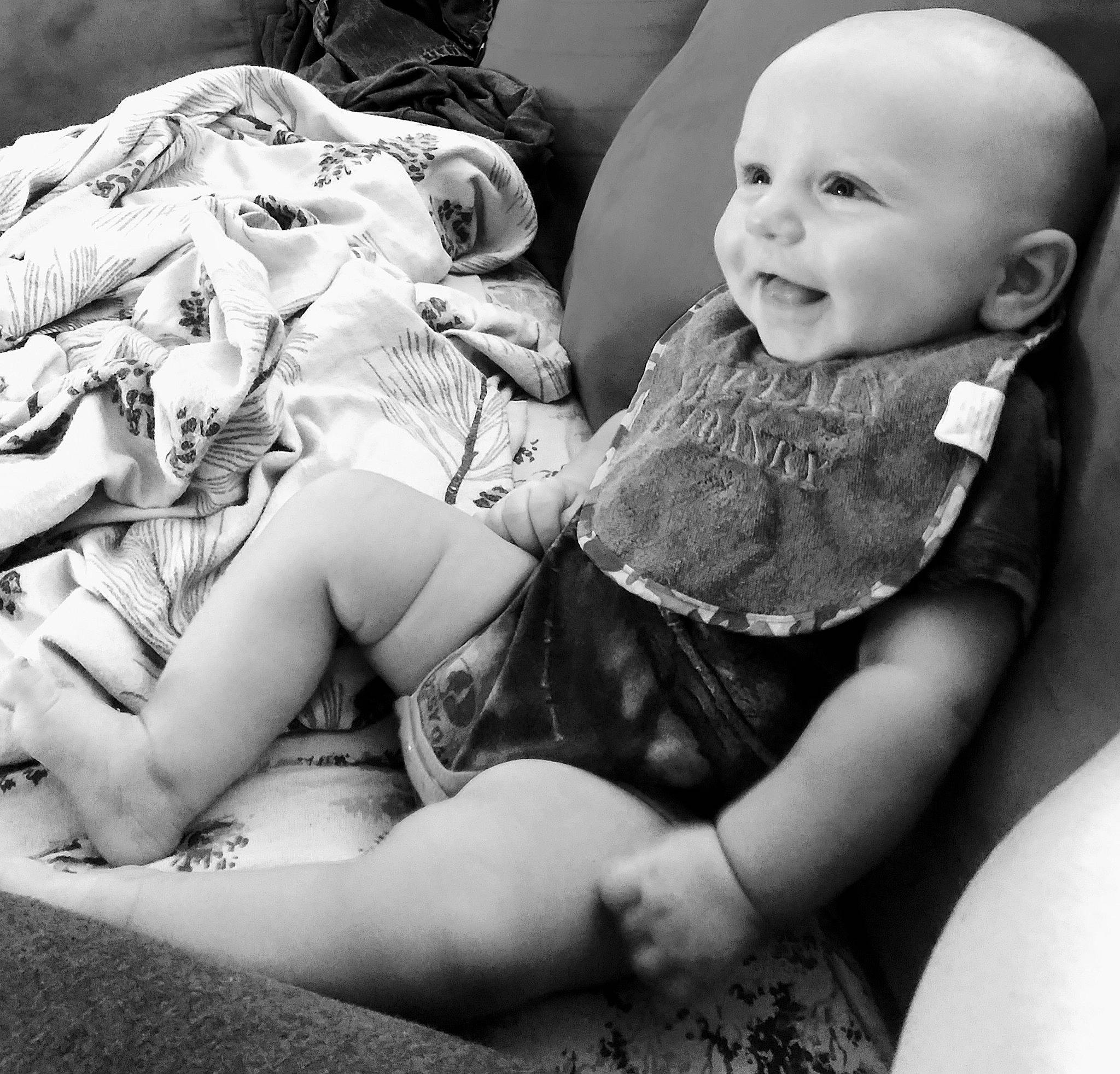 Wyatt is registered to the contest to win money with this photo: baby, birth, black_and_white, child, family, leg, monochrome, monochrome_photography, people, person, photograph, photography, sibling, sitting, smile, style, toddler