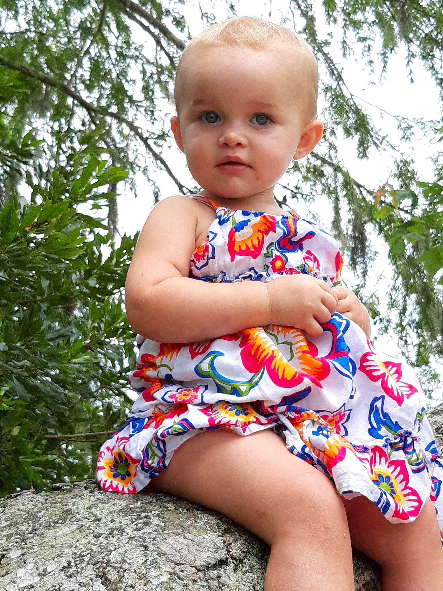 Ambrielle is registered to the contest to win money with this photo: baby, baby_toddler_clothing, child, dress, pattern, person, plant, play, sitting, smile, summer, toddler