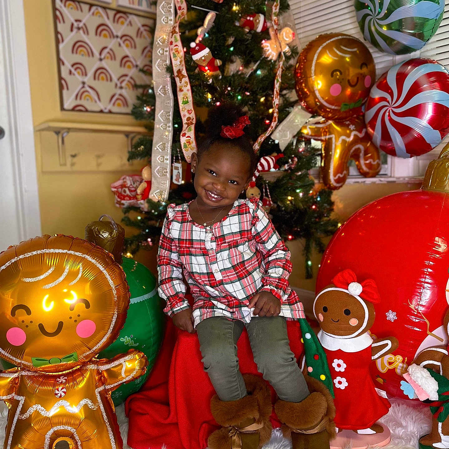 Alayiah is registered to the contest to win money with this photo: accessories, baby, ball, balloon, christmas, christmasdecorations, christmastree, clothing, face, festival, football, footwear, head, jewelry, necklace, person, photography, portrait, shoe, sitting