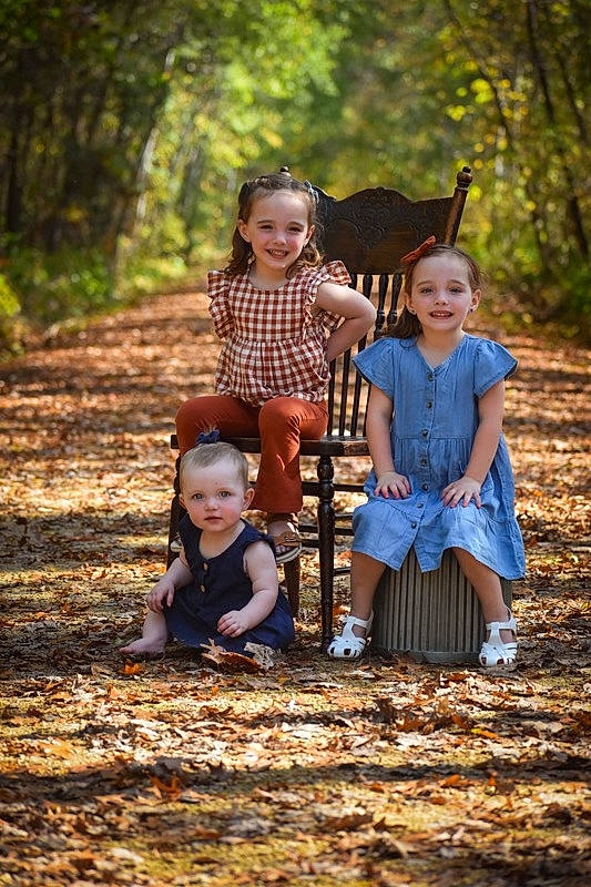 Oakley is registered to the contest to win money with this photo: dress, face, fun, grass, happy, human_body, interaction, joy, leaf, leisure, mammal, people_in_nature, person, plant, smile, standing, sunlight, toddler, tree, vertebrate