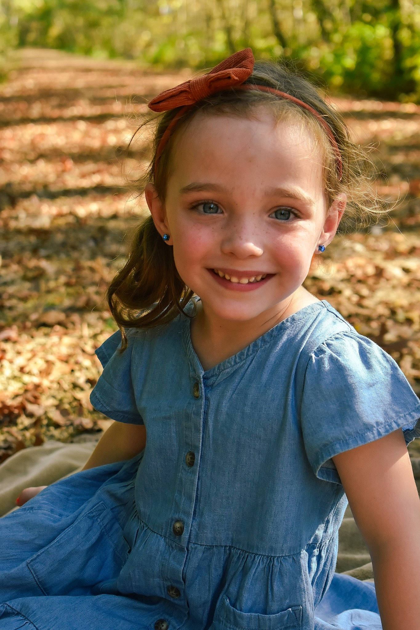 Taytum is registered to the contest to win money with this photo: beauty, brown_hair, child, chin, eye, flash_photography, fun, grass, happy, iris, joy, leaf, leisure, lip, long_hair, people_in_nature, person, plant, skin, smile