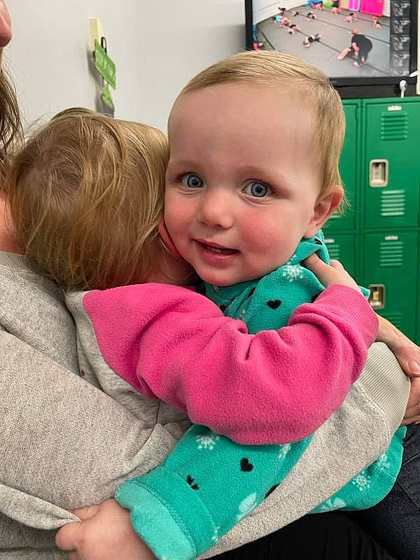 Hadley joined the competition — help win amazing prizes! baby, baby_toddler_clothing, blond, cheek, child, comfort, facial_expression, flooring, fun, grass, green, happy, iris, joy, person, play, shelf, sitting, skin, smile